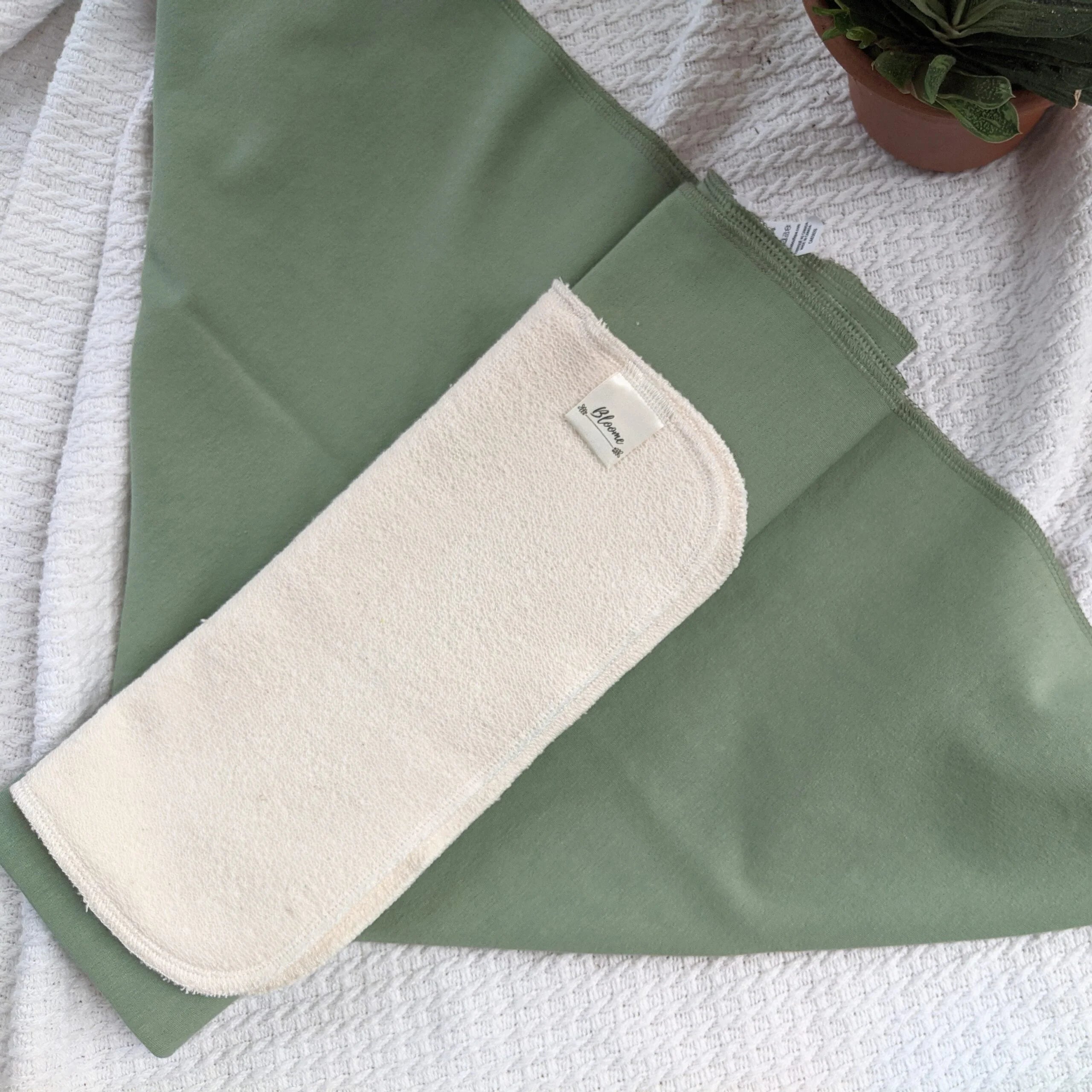 Booster bifold in tessuto naturale Bloome